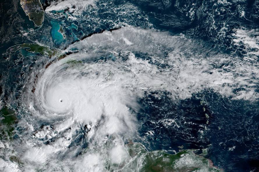 Hurricane Melissa, which has developed into a Category 5 storm, moves north in the Caribbean Sea towards Jamaica and Cuba
