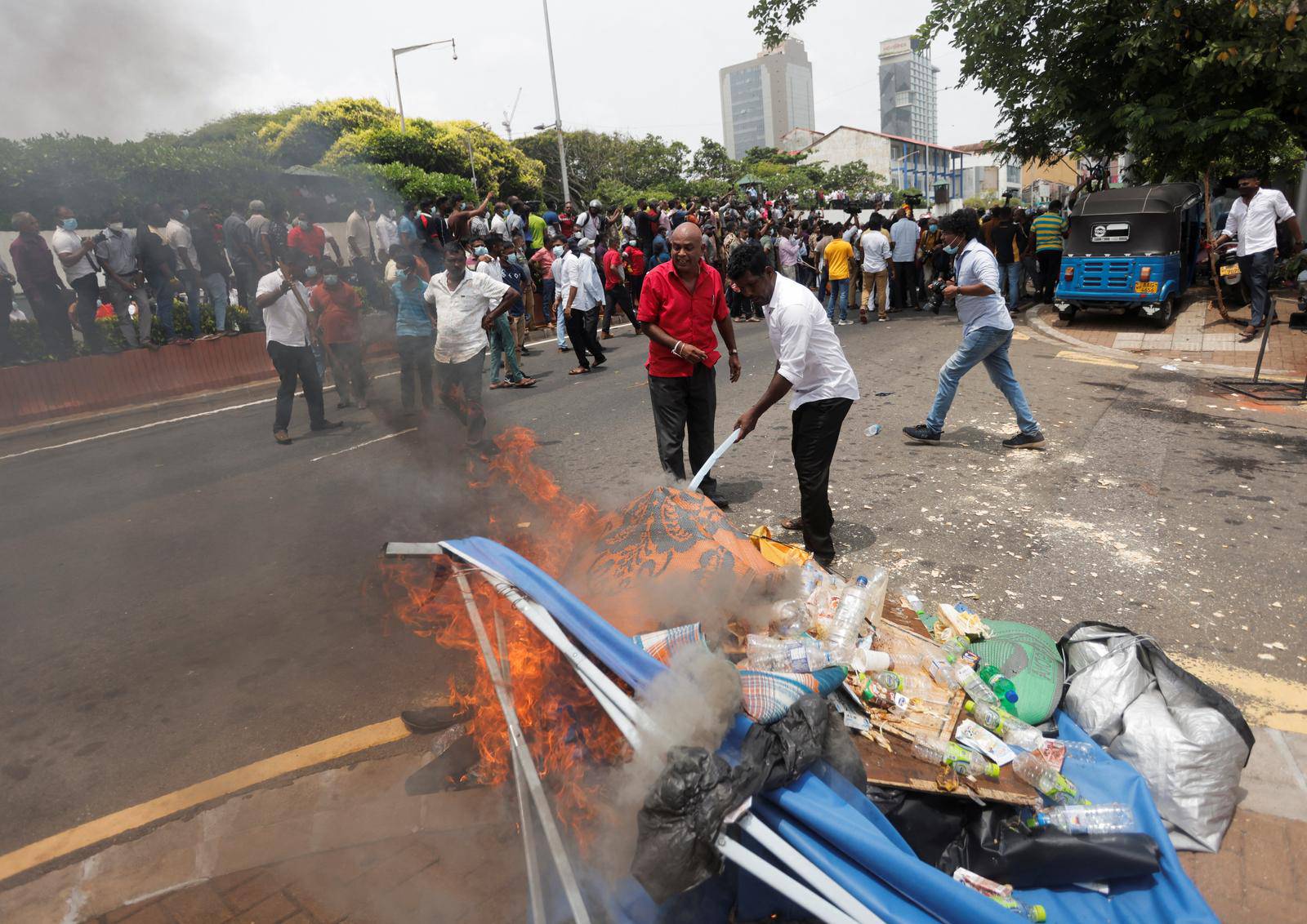 Sri Lanka's ruling party supporters storm anti-government protest camp, in Colombo