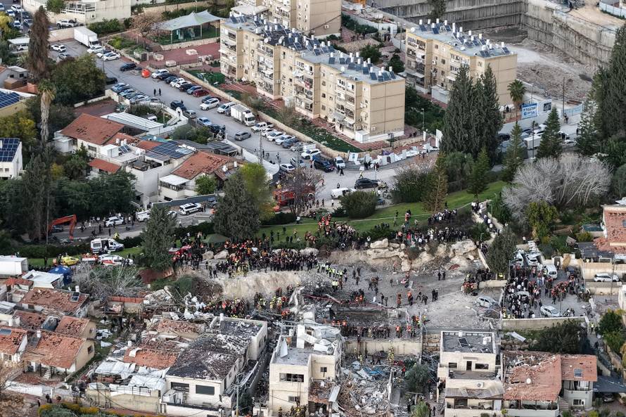 A drone view of the scene of a fatal Iranian strike, after Iran launched missile barrages following attacks by the U.S. and Israel on Saturday, in Beit Shemesh