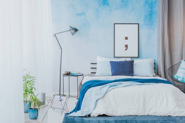 Romantic,Bedroom,Interior,With,Blue,Accents,,Poster,,Lamp,And,Watercolor
