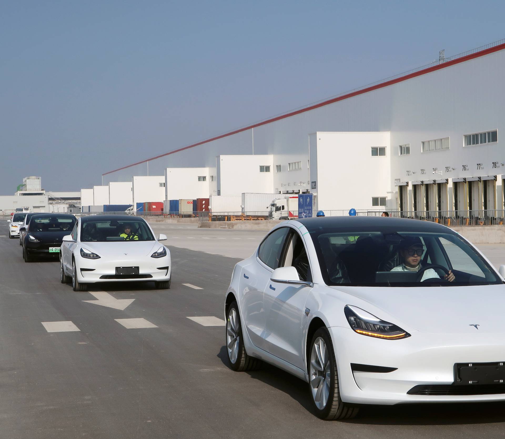 China-made Tesla Model 3 vehicles are seen at the Shanghai Gigafactory of the U.S. electric car maker in Shanghai