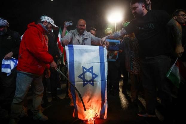 People gather after a two-week ceasefire in the Iran war was announced, in Tehran