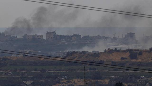 Smoke rises over Gaza during Israeli strikes, as seen from southern Israel
