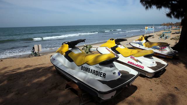 A mostly deserted beach is seen at Senegambia a day after the country declared a state of emergency, in Banjul