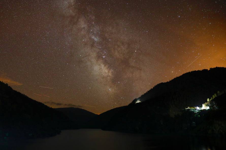 Milky Way is seen during the annual Perseid meteor shower above Salime Reservoir, near Grandas de Salime