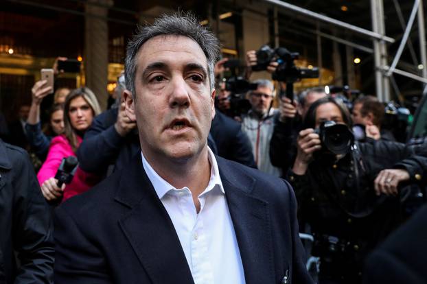 FILE PHOTO: Michael Cohen, a former lawyer for U.S. President Donald Trump leaves his apartment to report to prison in New York