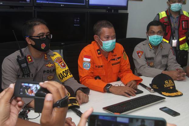 Head of Pontianak Basarnas, Yopi, gives a speech during a conference after Sriwijaya Air Flight SJ182 lost contact