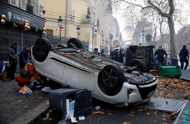 Members of the Kurdish community gather at the Place de la Republique square following the shooting, in Paris