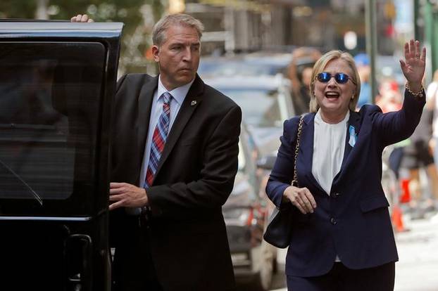 U.S. Democratic presidential candidate Hillary Clinton leaves her daughter Chelsea