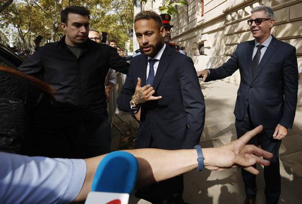 Brazil's Neymar to stand trial in a corruption case over his transfer to FC Barcelona