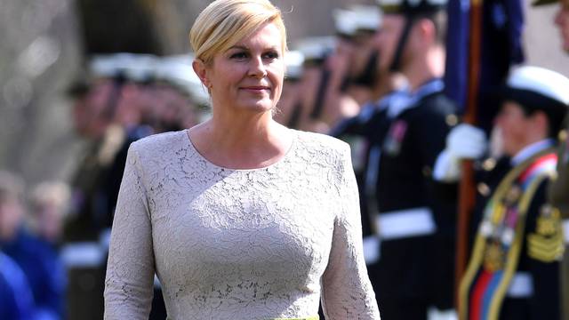 President of Croatia Kolinda Grabar-Kitarovic inspects an Australian military guard of honour during ceremonial welcome at Government House in Canberra