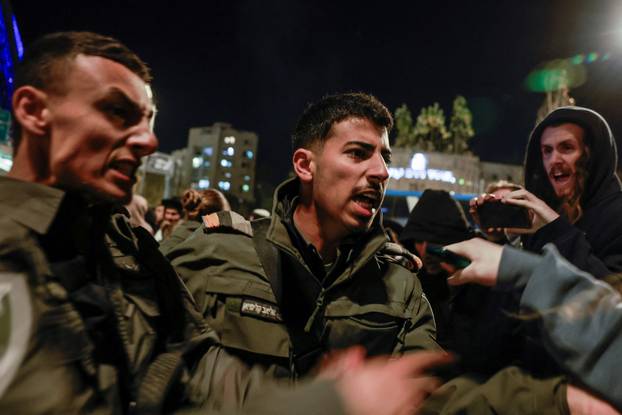 Israelis protest a ceasefire deal, in Jerusalem