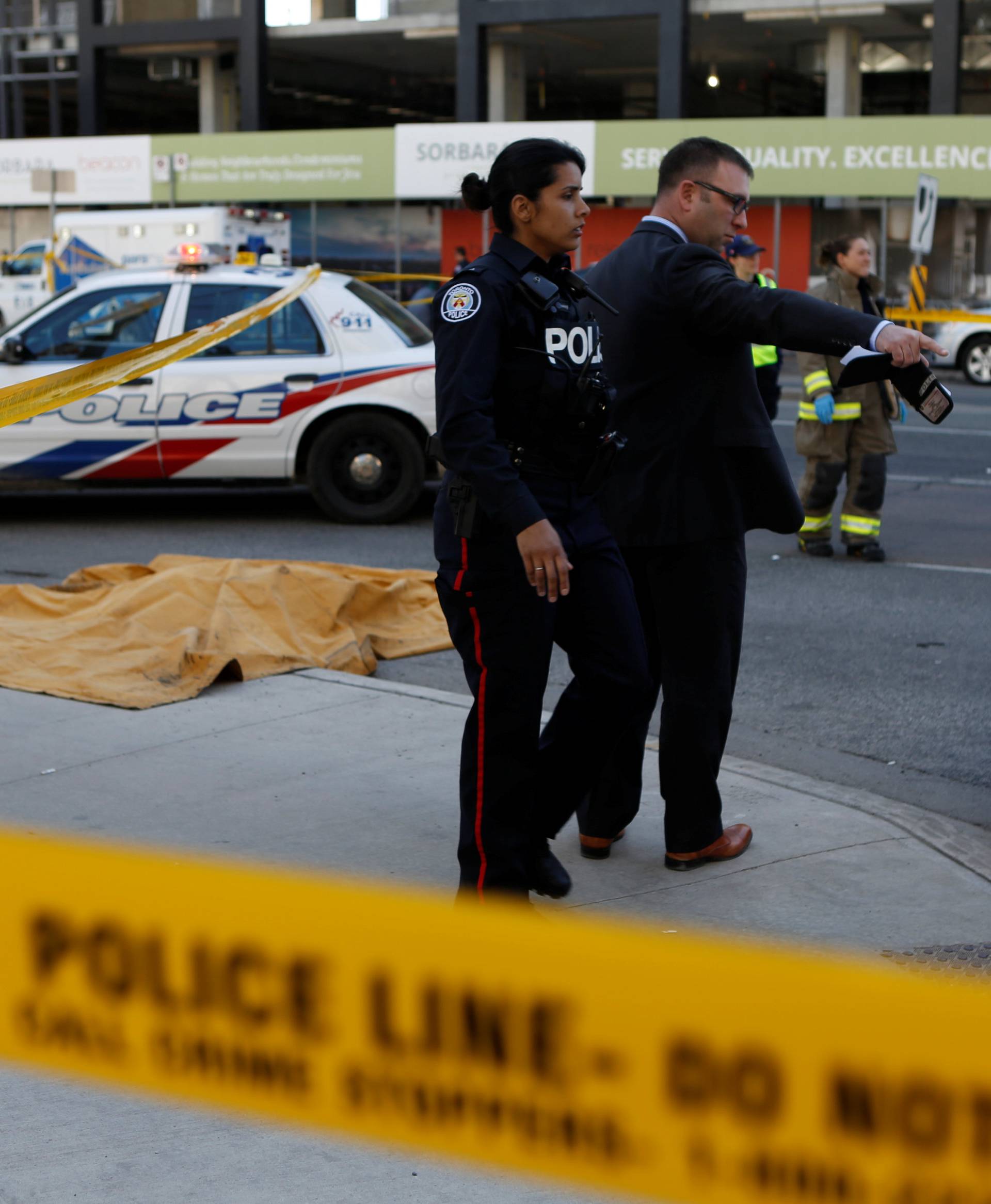 Toronto police investigates an incident where a van struck multiple people at a major intersection in Toronto's northern suburbs