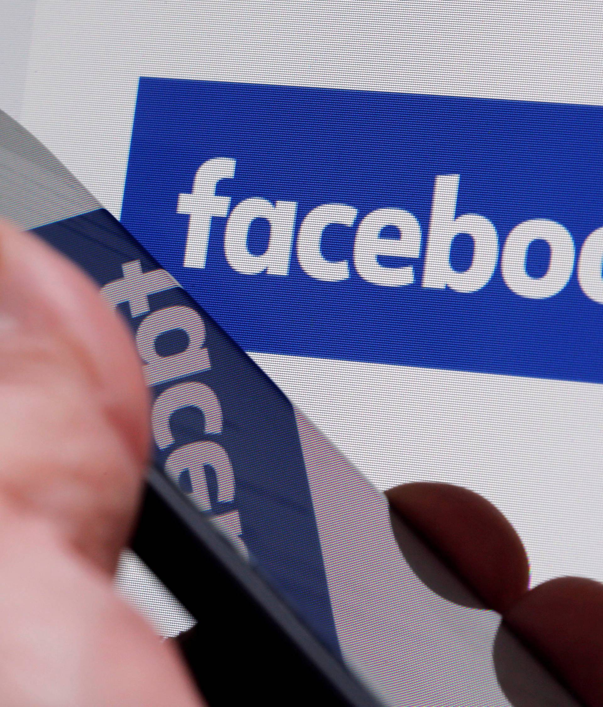 FILE PHOTO: The Facebook logo is displayed on the company's website in Bordeaux, France