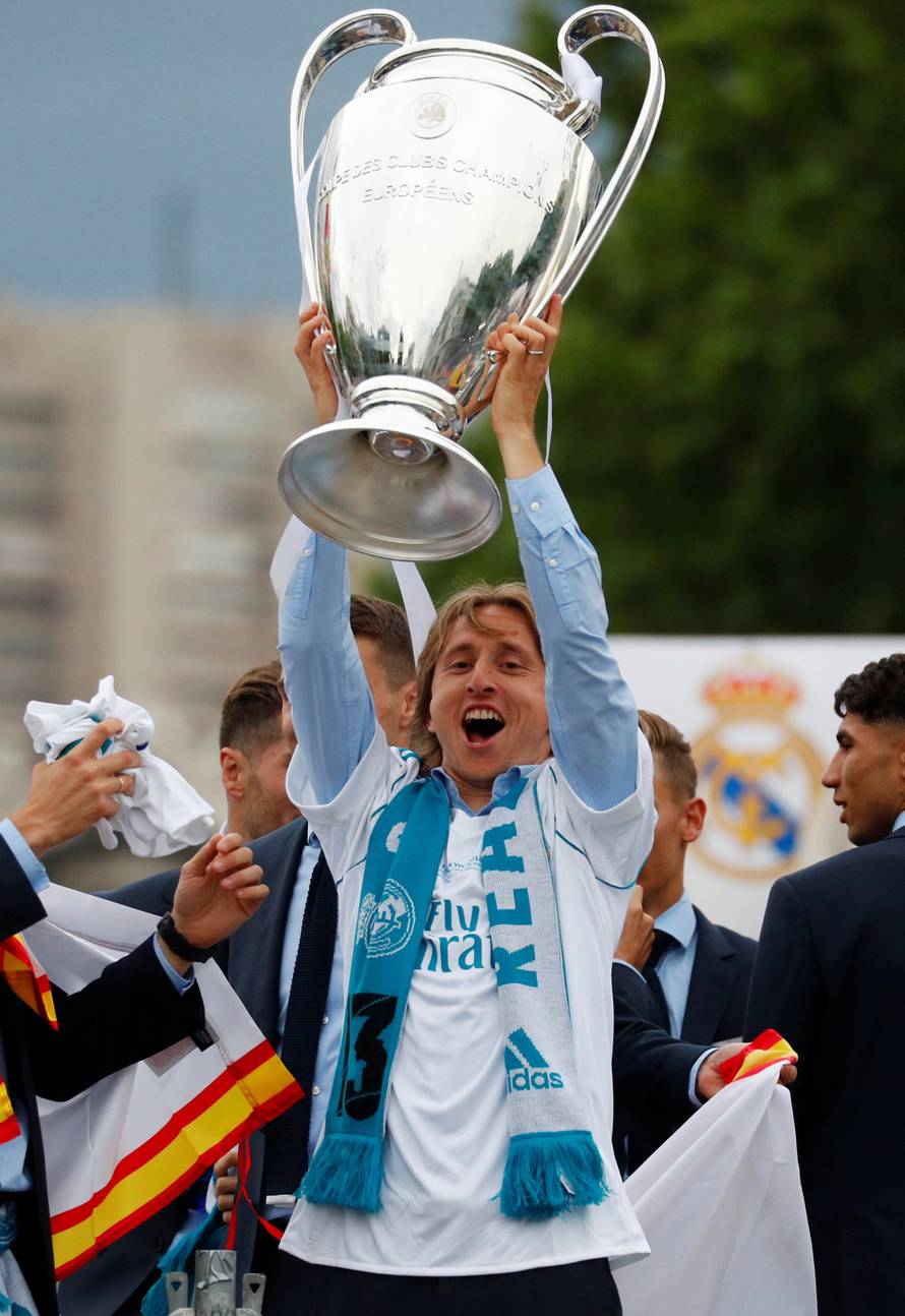 Real Madrid celebrate winning the Champions League Final