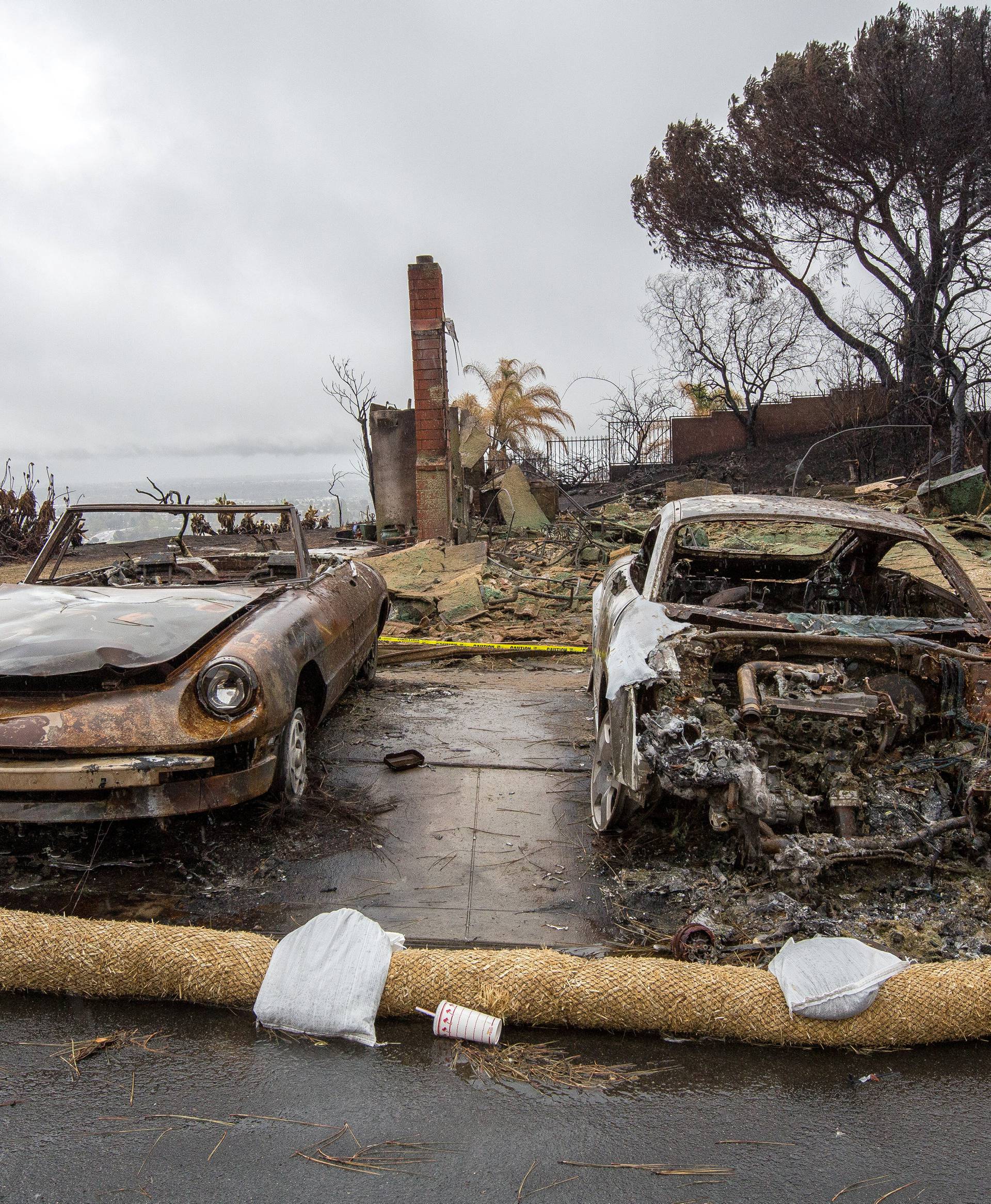 Cars were burnt in the Thomas Fire during a winter rain storm in Ventura