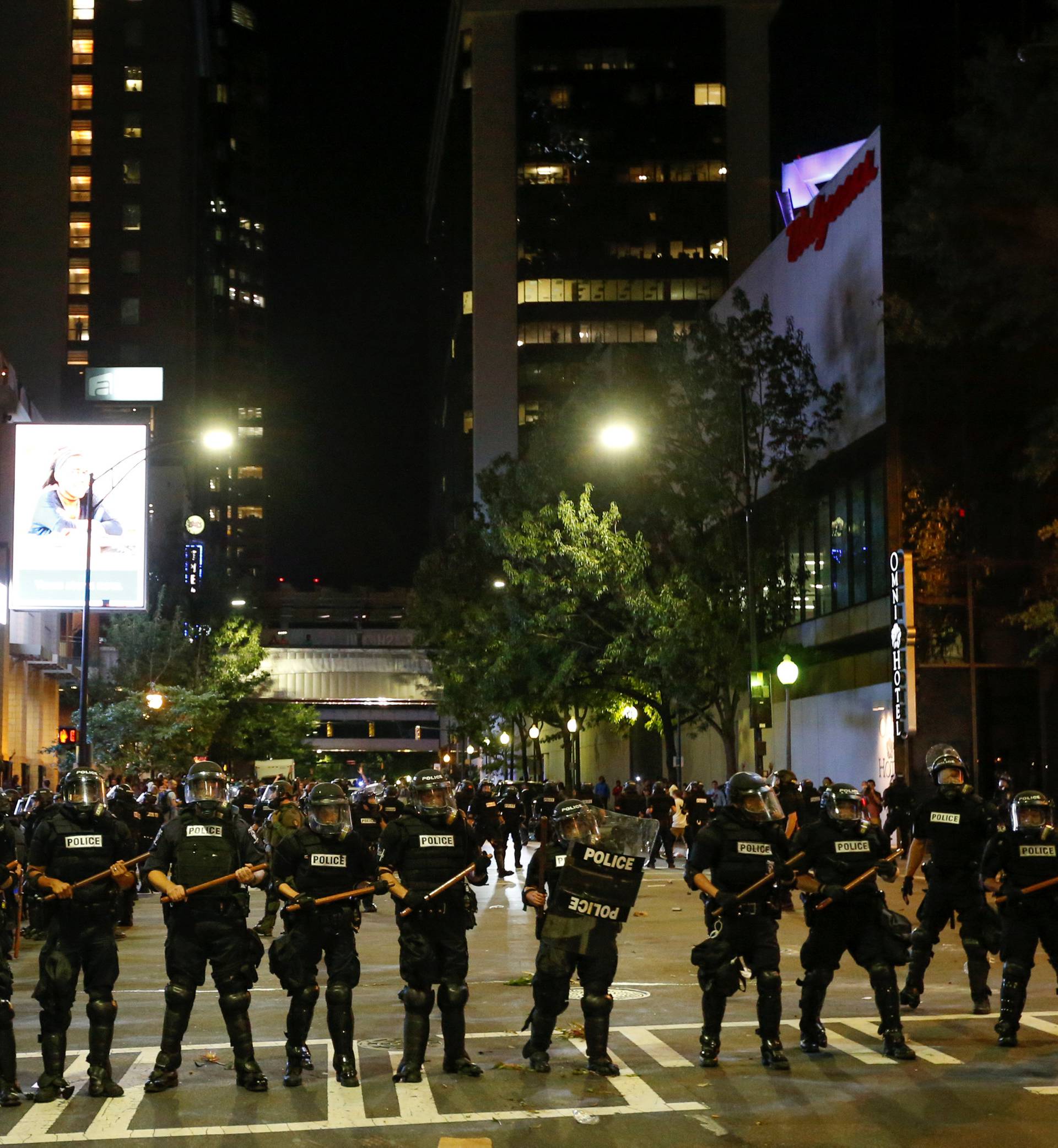 Police hold their lines in uptown Charlotte, NC during a protest of the police shooting of Keith Scott, in Charlotte
