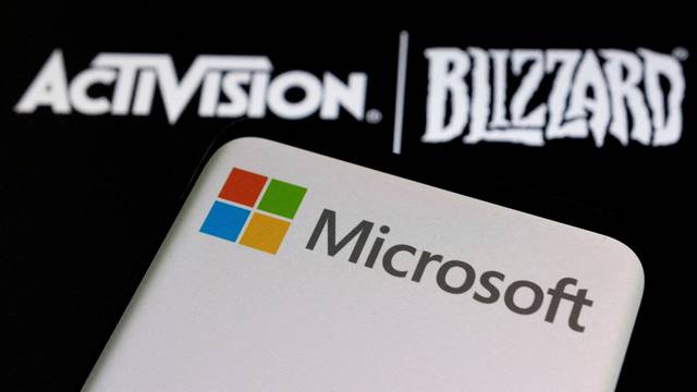 FILE PHOTO: Illustration of Microsoft and Activision Blizzard logos