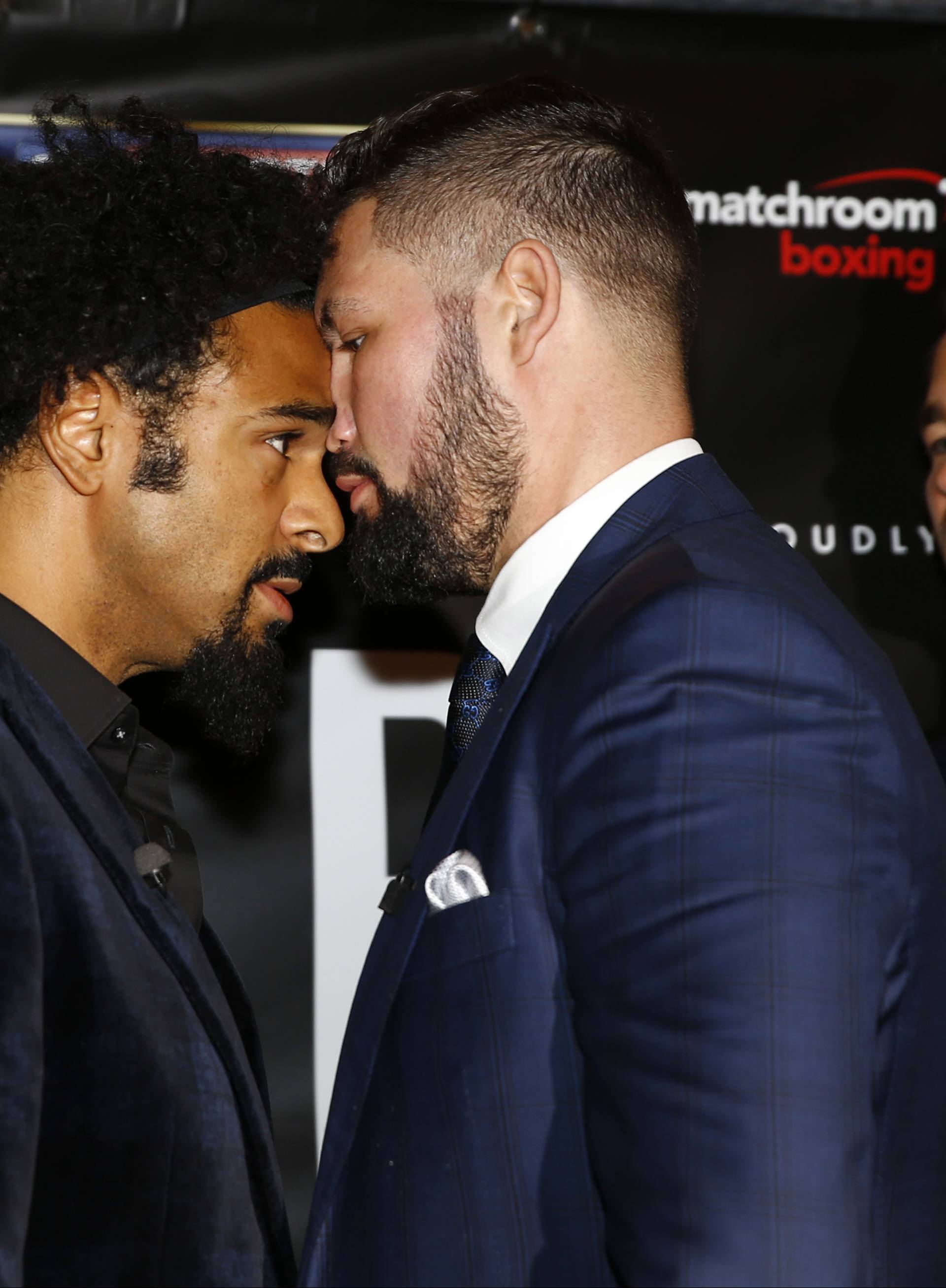 David Haye and Tony Bellew go head to head after the press conference as promoter Eddie Hearn looks on