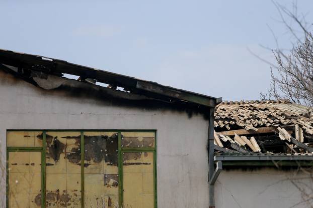 Rescue crews operate outside a night club, following a fire resulting in casualties, in the town of Kocani