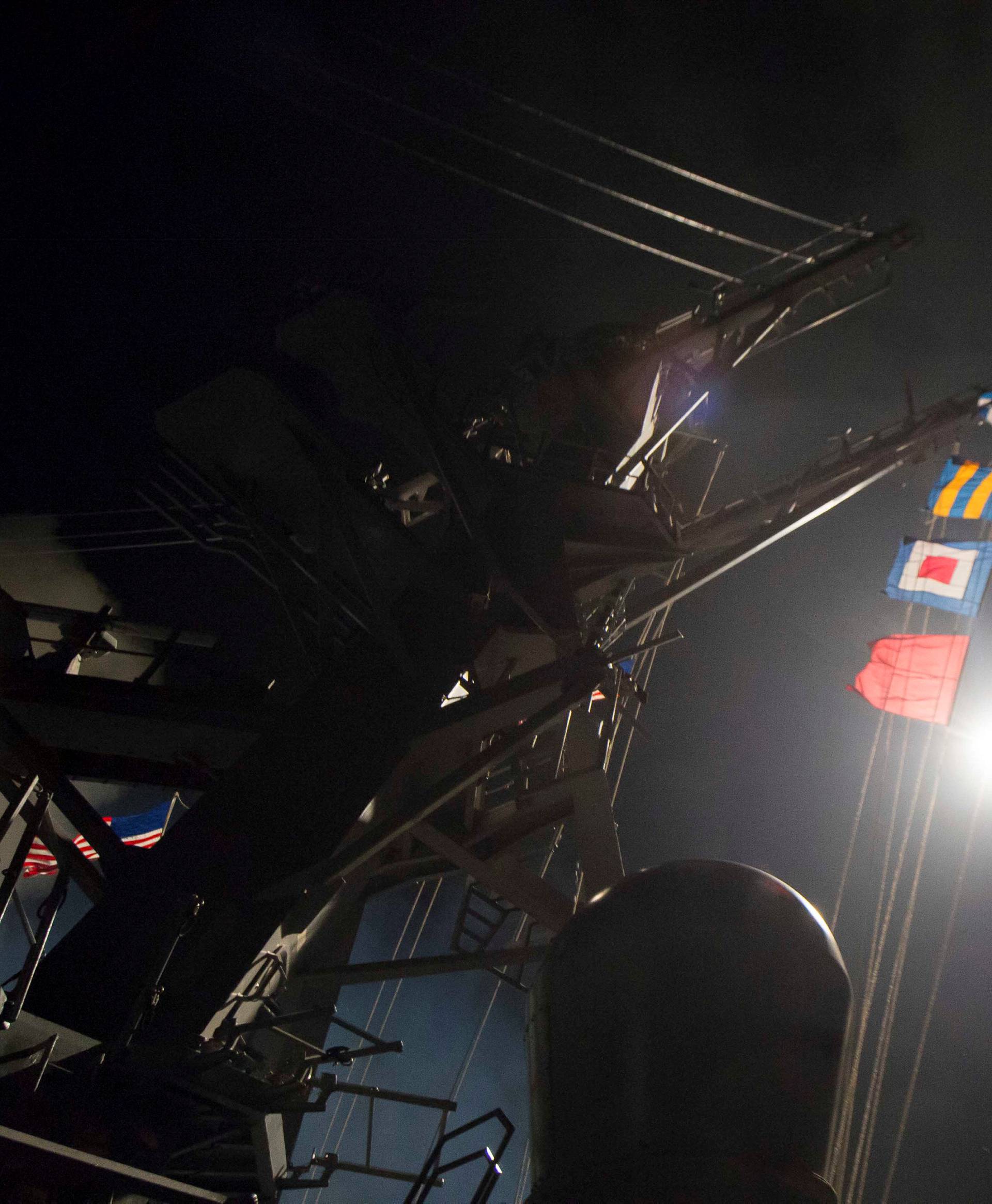 U.S. Navy guided-missile destroyer USS Ross (DDG 71) fires a tomahawk land attack missile in Mediterranean Sea