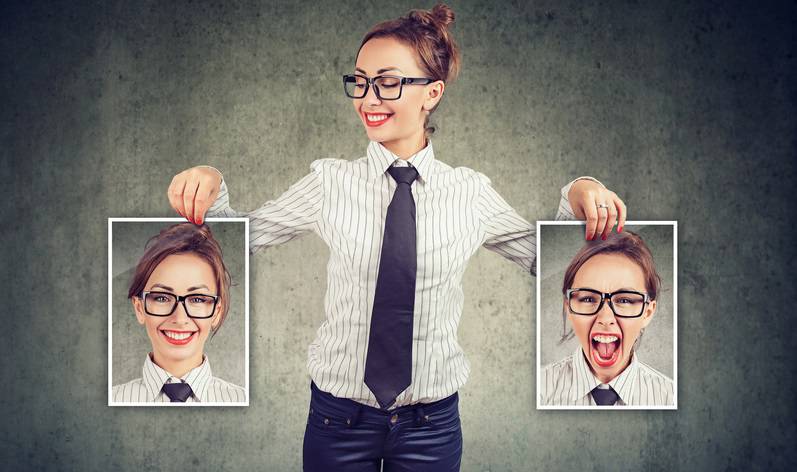 Cheerful woman showing different photos with emotions