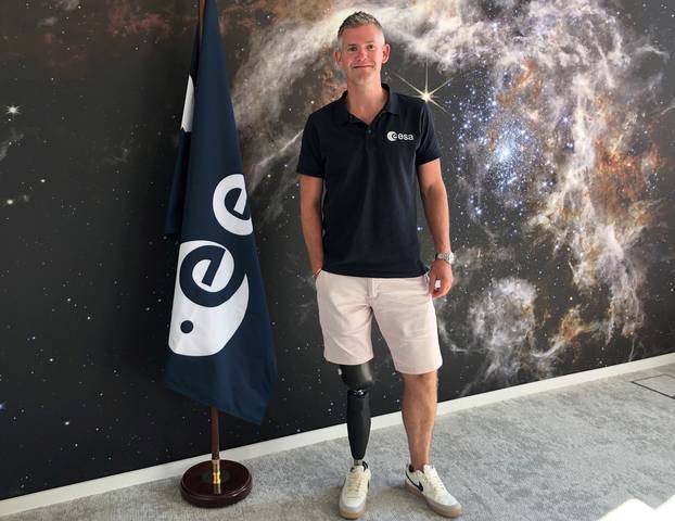 "Parastronaut" carries flag at the start of the Paralympic Games