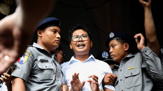 Reuters journalist Wa Lone departs Insein court after his verdict announcement in Yangon