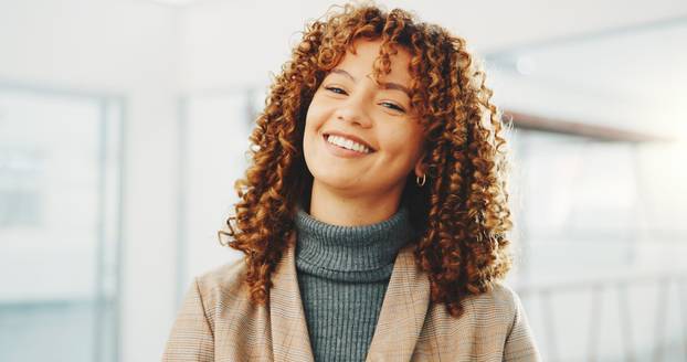 Happy, professional and portrait of businesswoman in office with confidence for career in real estate. Smile, rental agency and property agent with pride for job opportunity, about us or lease.