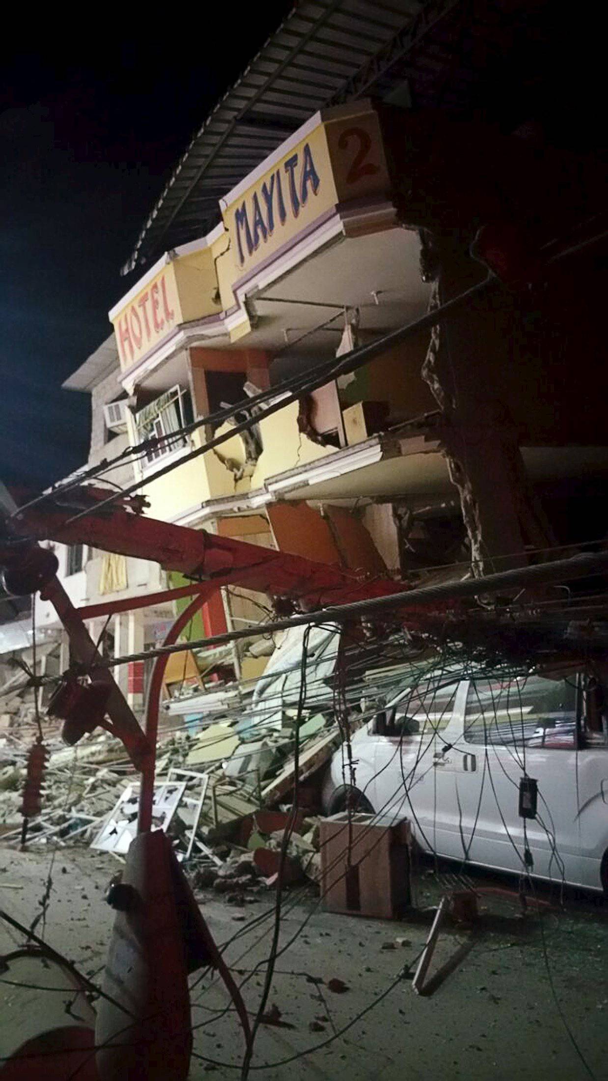 A collapsed hotel is seen after a 7.8 magnitude earthquake struck off the country's northwest Pacific coast causing "considerable damage", in Manta