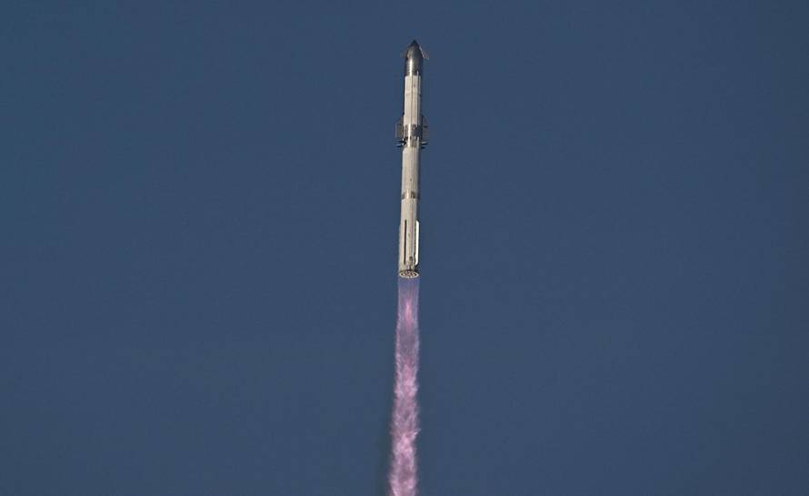 A SpaceX Super Heavy booster carrying the Starship spacecraft lifts off on its 10th test flight