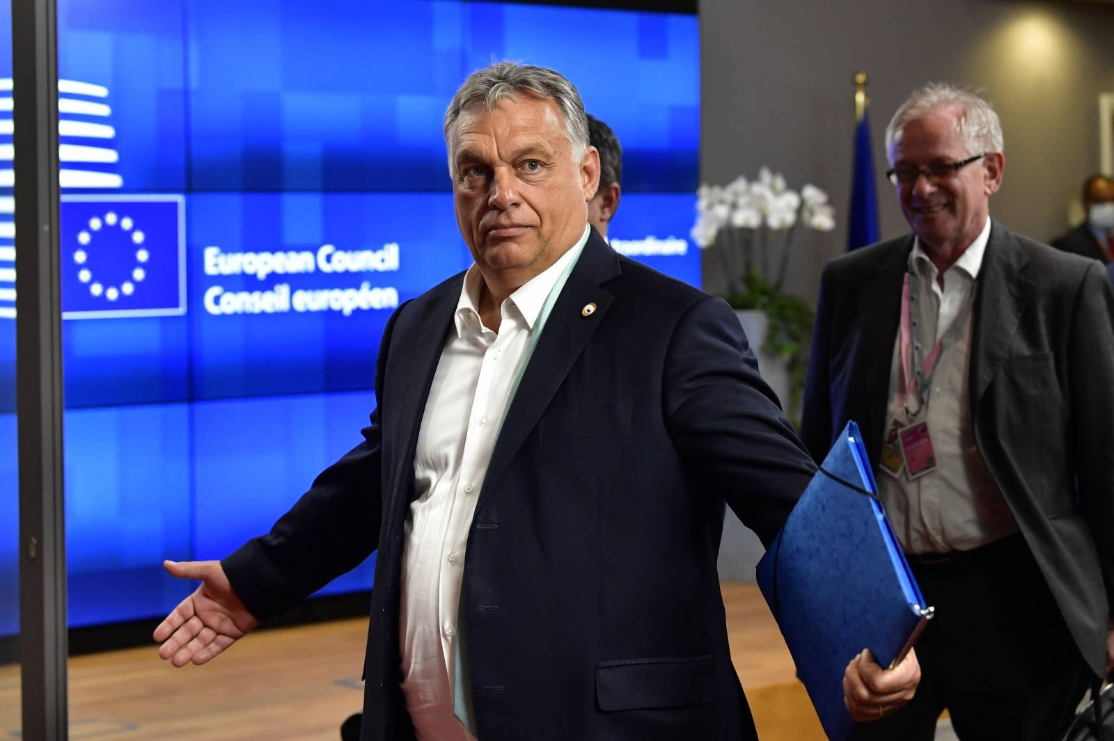 Hungary's Prime Minister Viktor Orban leaves after a meeting of an EU summit on a coronavirus recovery package at the European Council building in Brussels