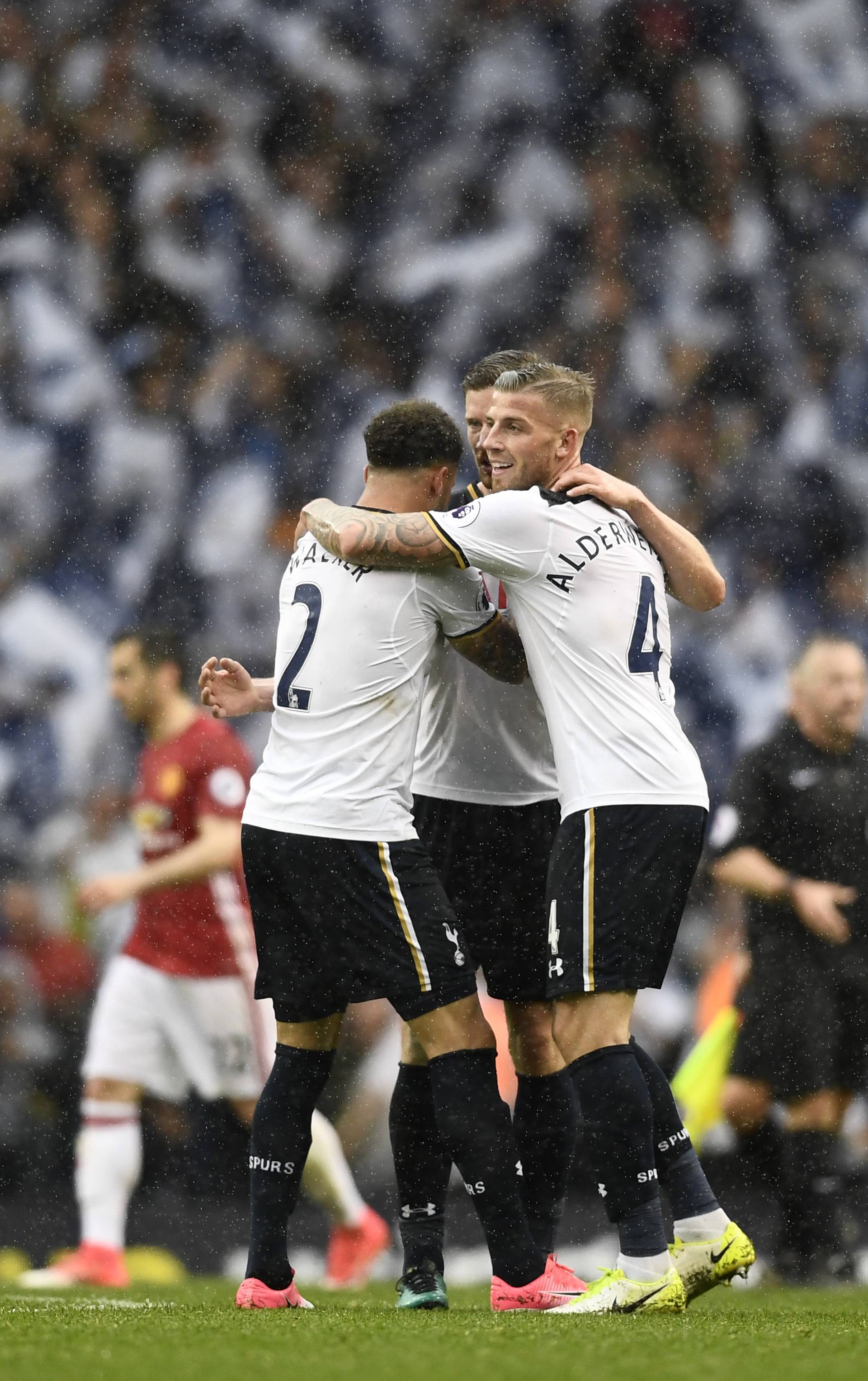 Tottenham's Toby Alderweireld and Kyle Walker celebrate after the match