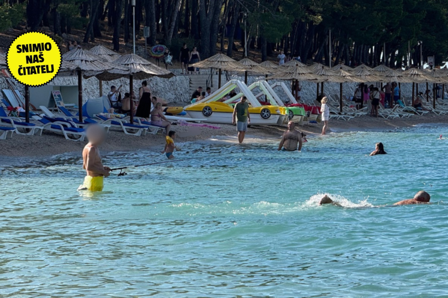 Ribič na plaži