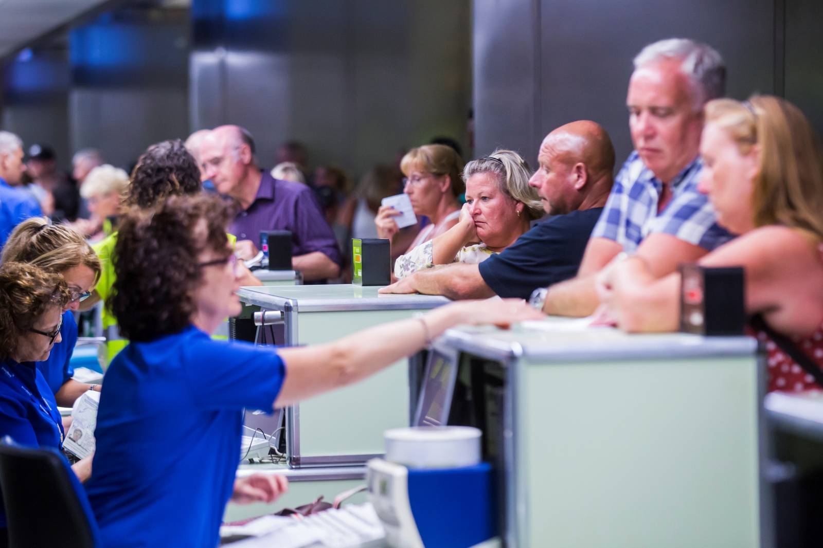 Thomas Cook passengers are seen at Las Palmas Airport after the world's oldest travel firm collapsed