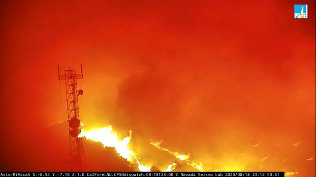 Flames from the Hennessey Fire rage in the last image from a camera mounted in a tower northwest of Vacaville