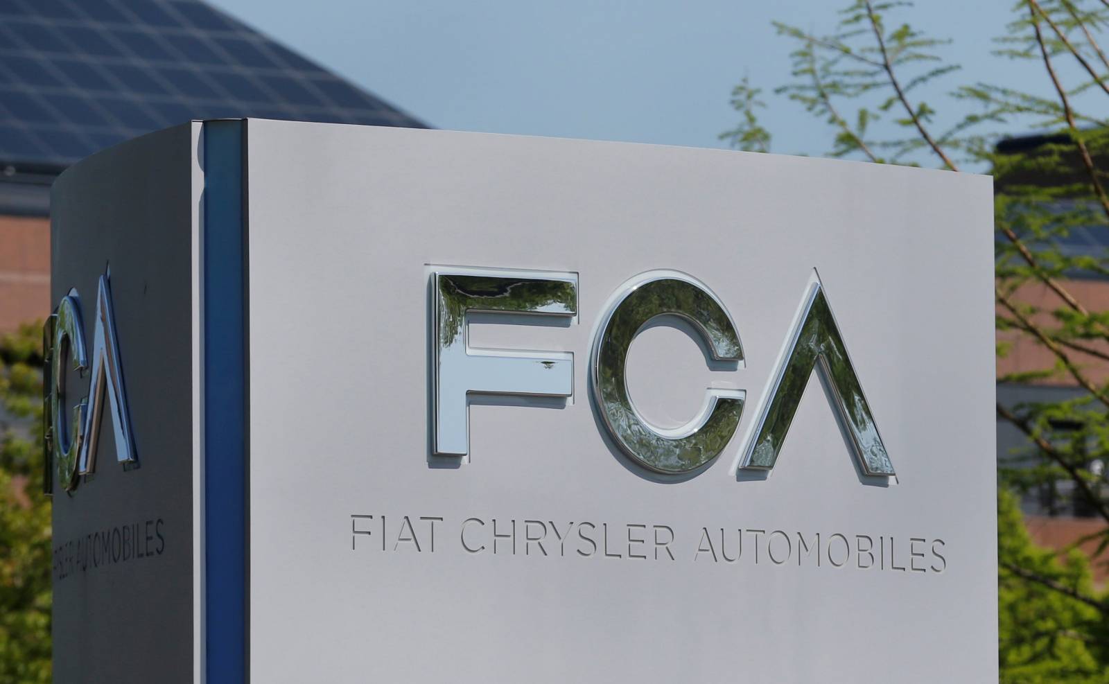 FILE PHOTO: A Fiat Chrysler Automobiles (FCA) sign at its U.S. headquarters in Auburn Hills, Michigan