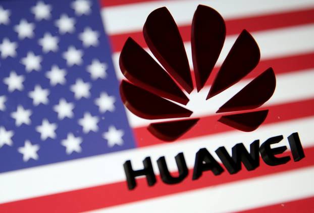 FILE PHOTO: A 3D printed Huawei logo is placed on glass above displayed U.S. flag in this illustration