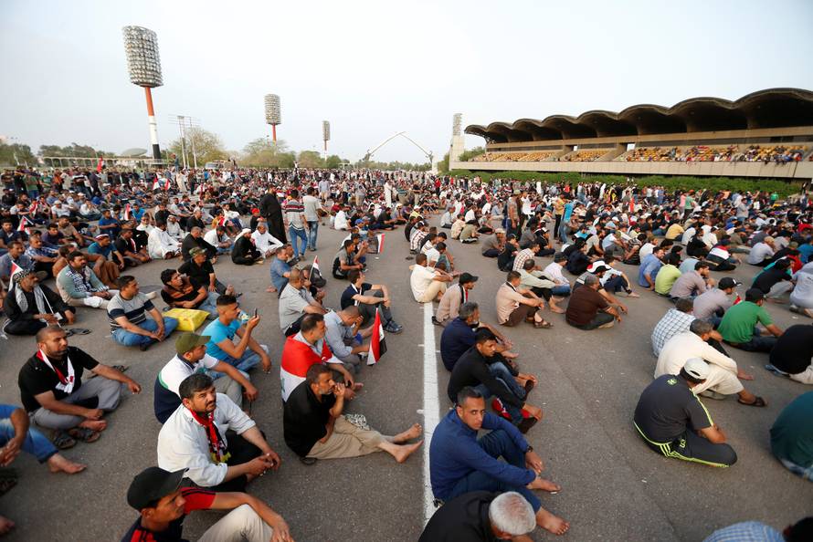 Followers of Iraqi Shi'ite cleric Moqtada al-Sadr gather at Grand Festivities Square within the Green Zone in Baghdad