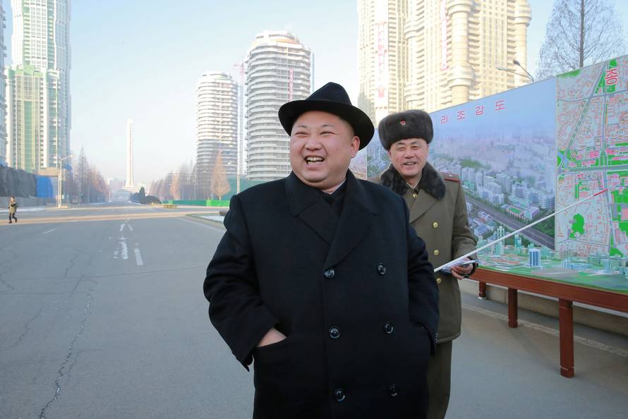 FILE PHOTO: KCNA photo of North Korean leader Kim Jong Un inspecting the construction site of Ryomyong Street