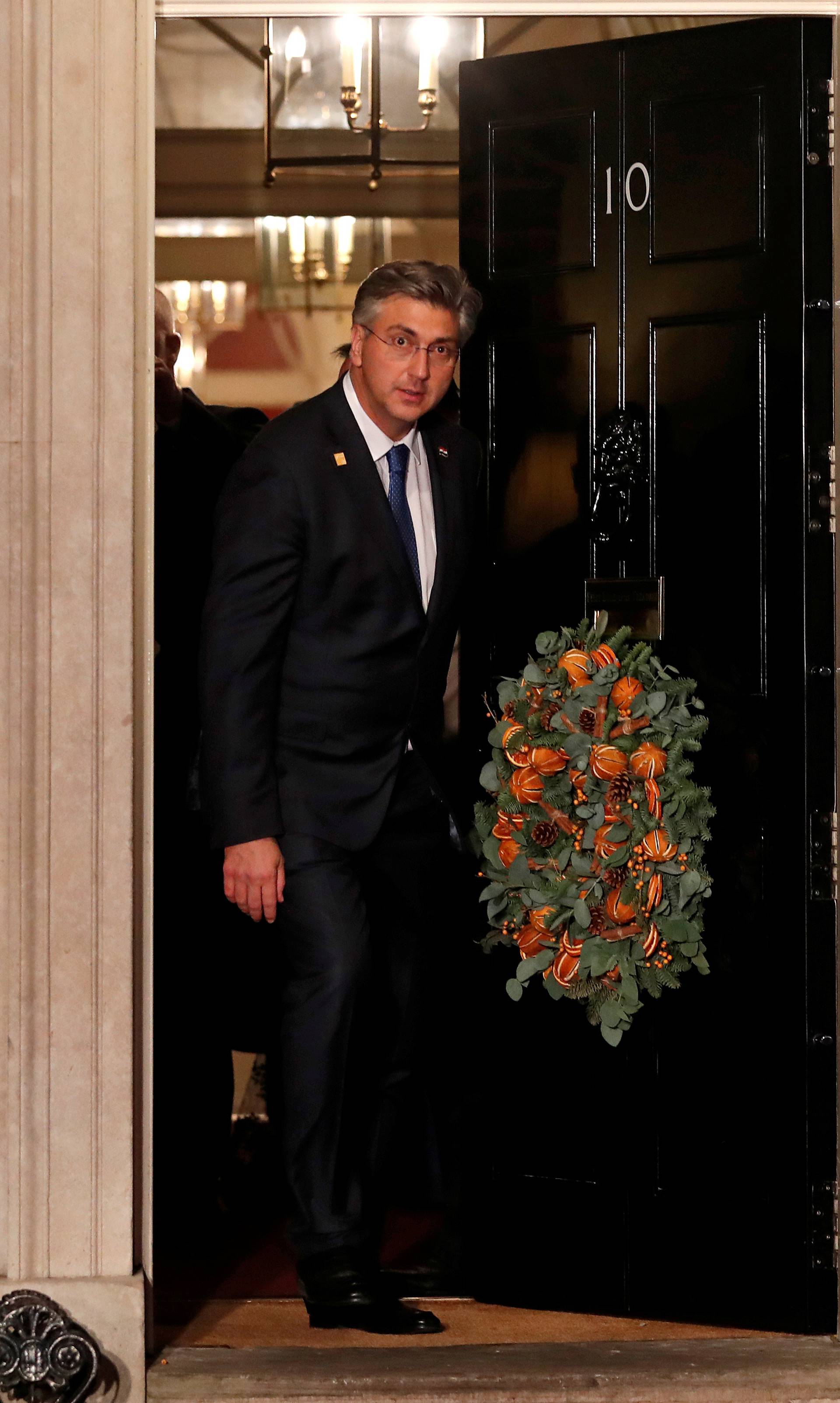 NATO leaders leave a reception at Downing Street, in London