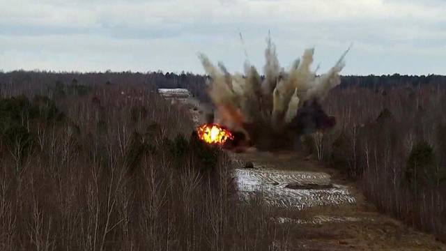 An explosion is seen during drills by the Ukrainian Air Force at an unidentified location in Ukraine in this screen grab from an undated handout video