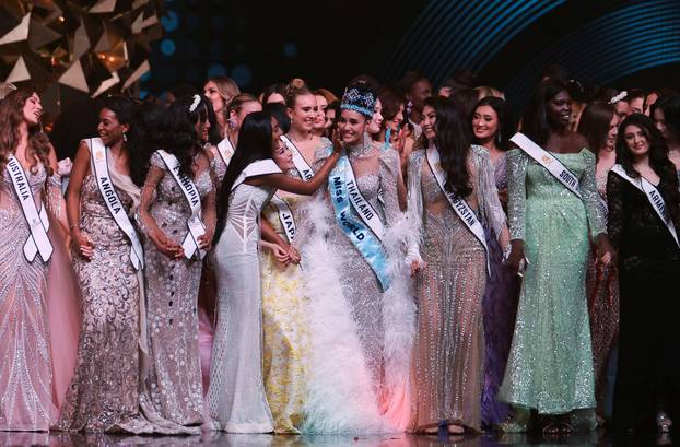 Thailand's Opal Suchata Chuangsri celebrates with other contestants after being crowned Miss World at the 72nd Miss World finale in Hyderabad