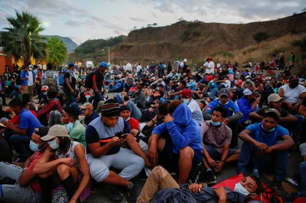Hondurans take part in a new caravan of migrants, set to head to the United States, in Vado Hondo