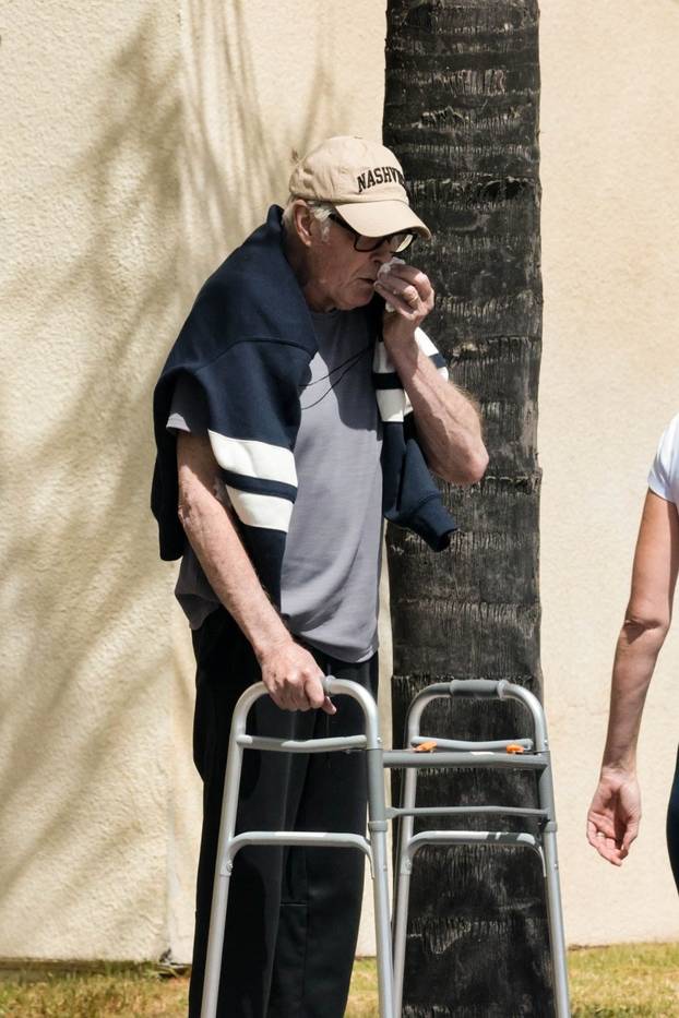 *PREMIUM-EXCLUSIVE* A frail looking David Hasselhoff uses a walker during an outing with his wife in West Hills **WEB EMBARGO UNTIL 10:10 PM EST, 4/24**