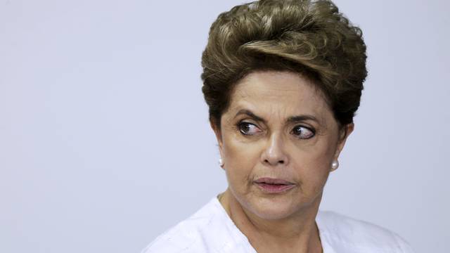 Brazil's President Rousseff looks on during signing of federal land transfer agreement for the government of the state of Amapa at Planalto Palace in Brasilia