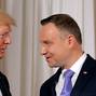 FILE PHOTO: U.S. President Donald Trump is greeted by Polish President Andrzej Duda in Warsaw