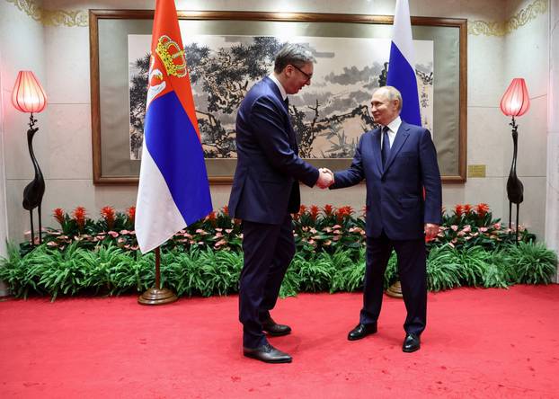 Russian President Vladimir Putin meets with Serbian President Aleksandar Vucic in Beijing