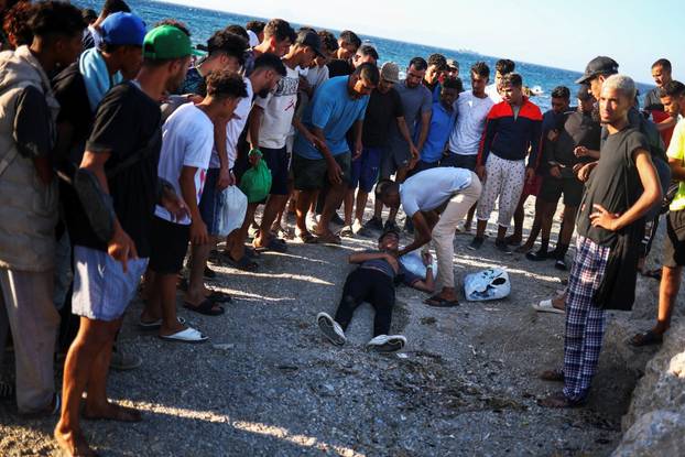 Mass crossings of migrants on foot and by sea from Morocco into Spanish territory, in Ceuta