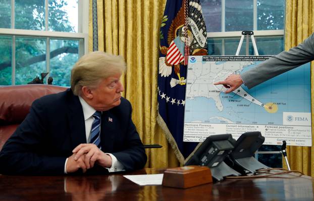 FILE PHOTO: U.S. President Trump holds an Oval Office meeting on hurricane preparations at the White House in Washington